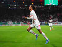 Yussuf Poulsen of Leipzig celebrates the teams third goal during the DFB Cup  Second Round match between RB Leipzig and FC St. Pauli at Red...