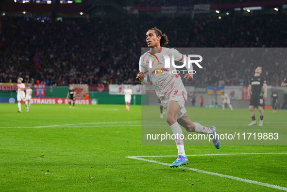 Yussuf Poulsen of Leipzig celebrates the teams third goal during the DFB Cup  Second Round match between RB Leipzig and FC St. Pauli at Red...