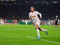 Yussuf Poulsen of Leipzig celebrates the teams third goal during the DFB Cup  Second Round match between RB Leipzig and FC St. Pauli at Red...