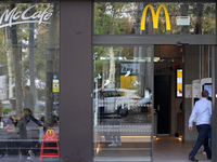 A McDonald's branch in the commercial area of Barcelona, Spain, on October 29, 2024, has Halloween decorations on its windows. (