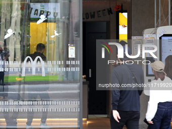 A McDonald's branch in the commercial area of Barcelona, Spain, on October 29, 2024, has Halloween decorations on its windows. (