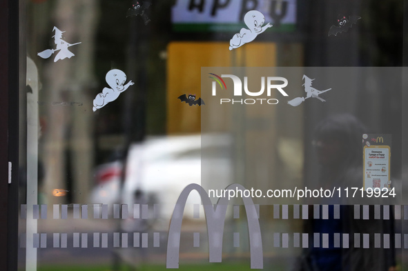 A McDonald's branch in the commercial area of Barcelona, Spain, on October 29, 2024, has Halloween decorations on its windows. 