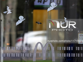 A McDonald's branch in the commercial area of Barcelona, Spain, on October 29, 2024, has Halloween decorations on its windows. (