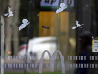 A McDonald's branch in the commercial area of Barcelona, Spain, on October 29, 2024, has Halloween decorations on its windows. (