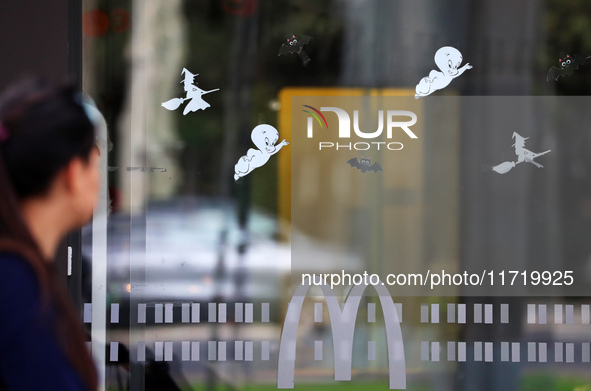 A McDonald's branch in the commercial area of Barcelona, Spain, on October 29, 2024, has Halloween decorations on its windows. 