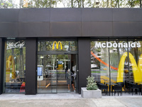 A McDonald's branch in the commercial area of Barcelona, Spain, on October 29, 2024, has Halloween decorations on its windows. (