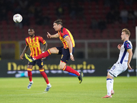 Federico Baschirotto of US Lecce is in action during the Serie A match between Lecce and Verona in Lecce, Italy, on October 29, 2024. (