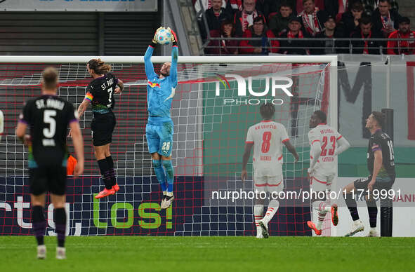 Maarten Vandevoordt of Leipzig controls the ball during the DFB Cup  Second Round match between RB Leipzig and FC St. Pauli at Red Bull aren...