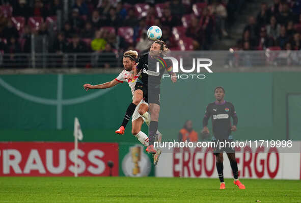 Jackson Irvine of FC St. Pauli heads during the DFB Cup  Second Round match between RB Leipzig and FC St. Pauli at Red Bull arena, Leipzig,...