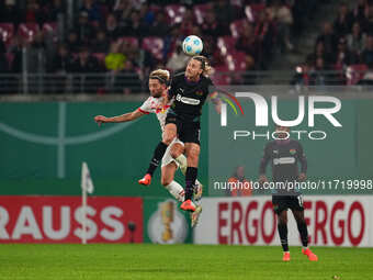 Jackson Irvine of FC St. Pauli heads during the DFB Cup  Second Round match between RB Leipzig and FC St. Pauli at Red Bull arena, Leipzig,...