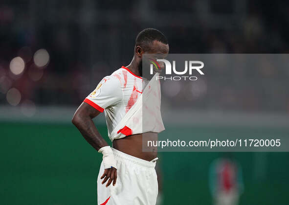 El Chadaille Bitshiabu of Leipzig gestures during the DFB Cup  Second Round match between RB Leipzig and FC St. Pauli at Red Bull arena, Lei...