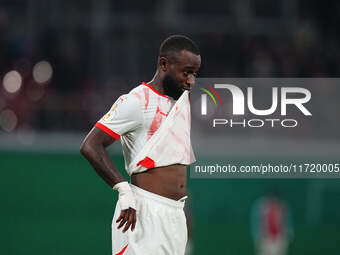 El Chadaille Bitshiabu of Leipzig gestures during the DFB Cup  Second Round match between RB Leipzig and FC St. Pauli at Red Bull arena, Lei...