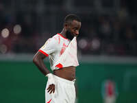 El Chadaille Bitshiabu of Leipzig gestures during the DFB Cup  Second Round match between RB Leipzig and FC St. Pauli at Red Bull arena, Lei...