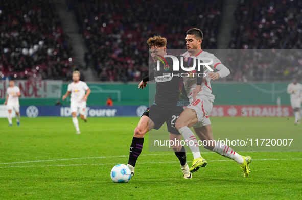 Philipp Treu of FC St. Pauli controls the ball during the DFB Cup  Second Round match between RB Leipzig and FC St. Pauli at Red Bull arena,...