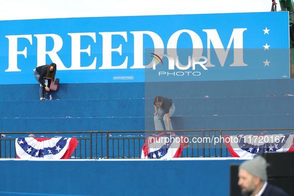 Volunteers make final preparations for a campaign rally for Vice President Kamala Harris on the Ellipse in Washington, D.C. on October 29, 2...