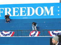 Volunteers make final preparations for a campaign rally for Vice President Kamala Harris on the Ellipse in Washington, D.C. on October 29, 2...