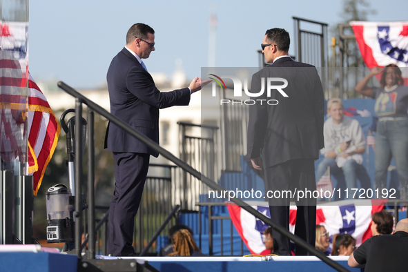 U.S. Secret Service officers make final preparations for a campaign rally for Vice President Kamala Harris on the Ellipse in Washington, D.C...