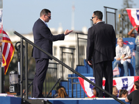 U.S. Secret Service officers make final preparations for a campaign rally for Vice President Kamala Harris on the Ellipse in Washington, D.C...