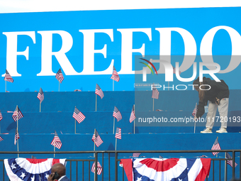 Volunteers make final preparations for a campaign rally for Vice President Kamala Harris on the Ellipse in Washington, D.C. on October 29, 2...