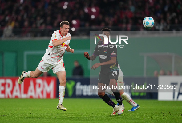 Lukas Klostermann of Leipzig heads during the DFB Cup  Second Round match between RB Leipzig and FC St. Pauli at Red Bull arena, Leipzig, Ge...