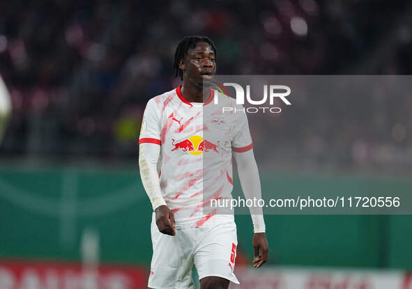 El Chadaille Bitshiabu of Leipzig looks on during the DFB Cup  Second Round match between RB Leipzig and FC St. Pauli at Red Bull arena, Lei...