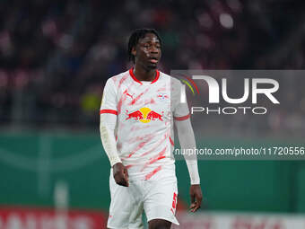 El Chadaille Bitshiabu of Leipzig looks on during the DFB Cup  Second Round match between RB Leipzig and FC St. Pauli at Red Bull arena, Lei...