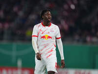 El Chadaille Bitshiabu of Leipzig looks on during the DFB Cup  Second Round match between RB Leipzig and FC St. Pauli at Red Bull arena, Lei...