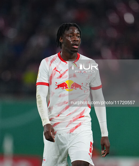 El Chadaille Bitshiabu of Leipzig looks on during the DFB Cup  Second Round match between RB Leipzig and FC St. Pauli at Red Bull arena, Lei...