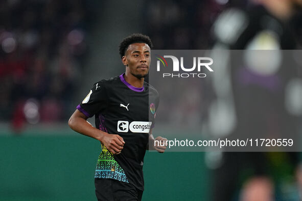 Oladapo Afolayan of FC St. Pauli looks on during the DFB Cup  Second Round match between RB Leipzig and FC St. Pauli at Red Bull arena, Leip...