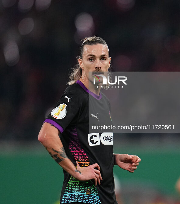 Jackson Irvine of FC St. Pauli looks on during the DFB Cup  Second Round match between RB Leipzig and FC St. Pauli at Red Bull arena, Leipzi...