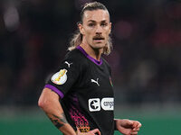 Jackson Irvine of FC St. Pauli looks on during the DFB Cup  Second Round match between RB Leipzig and FC St. Pauli at Red Bull arena, Leipzi...