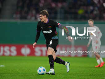 Eric Smith of FC St. Pauli controls the ball during the DFB Cup  Second Round match between RB Leipzig and FC St. Pauli at Red Bull arena, L...