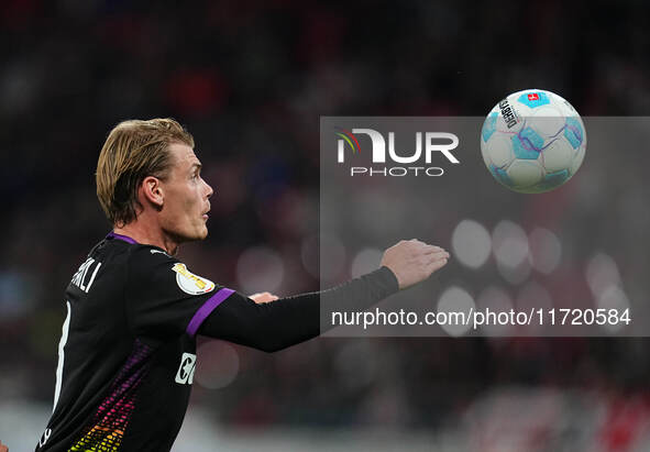 Eric Smith of FC St. Pauli controls the ball during the DFB Cup  Second Round match between RB Leipzig and FC St. Pauli at Red Bull arena, L...