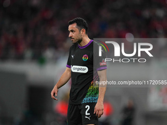 Manolis Saliakas of FC St. Pauli controls the ball during the DFB Cup  Second Round match between RB Leipzig and FC St. Pauli at Red Bull ar...