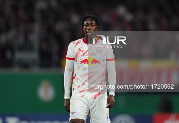 El Chadaille Bitshiabu of Leipzig looks on during the DFB Cup  Second Round match between RB Leipzig and FC St. Pauli at Red Bull arena, Lei...