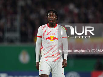 El Chadaille Bitshiabu of Leipzig looks on during the DFB Cup  Second Round match between RB Leipzig and FC St. Pauli at Red Bull arena, Lei...