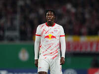 El Chadaille Bitshiabu of Leipzig looks on during the DFB Cup  Second Round match between RB Leipzig and FC St. Pauli at Red Bull arena, Lei...