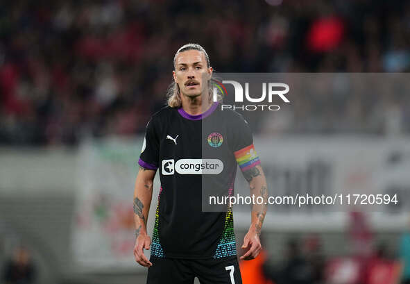 Jackson Irvine of FC St. Pauli looks on during the DFB Cup  Second Round match between RB Leipzig and FC St. Pauli at Red Bull arena, Leipzi...