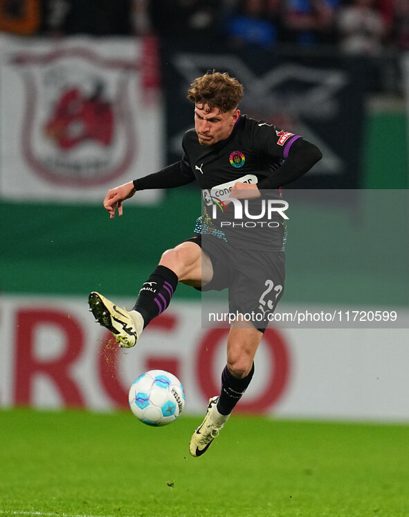 Philipp Treu of FC St. Pauli controls the ball during the DFB Cup  Second Round match between RB Leipzig and FC St. Pauli at Red Bull arena,...