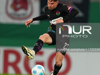 Philipp Treu of FC St. Pauli controls the ball during the DFB Cup  Second Round match between RB Leipzig and FC St. Pauli at Red Bull arena,...