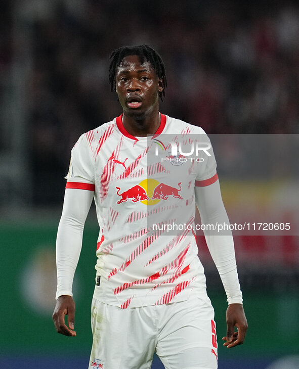 El Chadaille Bitshiabu of Leipzig looks on during the DFB Cup  Second Round match between RB Leipzig and FC St. Pauli at Red Bull arena, Lei...