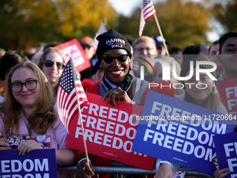 Supporters of Vice President Kamala Harris wait for a campaign rally to begin on the Ellipse in Washington, D.C. on October 29, 2024. (