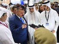 Sheikh Khalifa bin Hamad bin Khalifa Al Thani, Qatar's Minister of Interior, and Abdul-Amir al-Shammari, Iraq's Minister of Interior, look a...