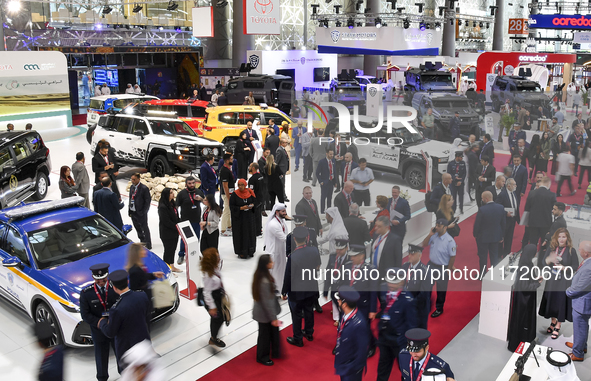 A general view shows people visiting after the opening ceremony of the 15th edition of the Milipol Qatar 2024 Exhibition and Conference in D...