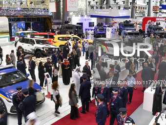 A general view shows people visiting after the opening ceremony of the 15th edition of the Milipol Qatar 2024 Exhibition and Conference in D...