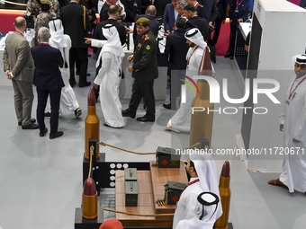 A general view shows people visiting after the opening ceremony of the 15th edition of the Milipol Qatar 2024 Exhibition and Conference in D...