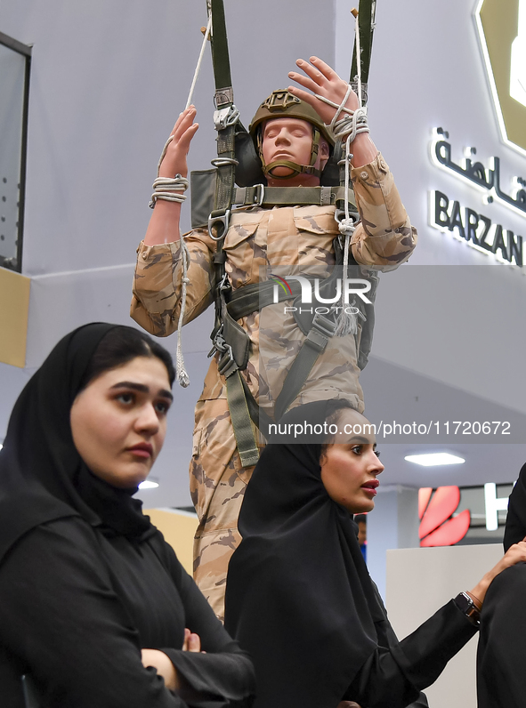 Qatari women visit after the opening ceremony of the 15th edition of the Milipol Qatar 2024 Exhibition and Conference in Doha, Qatar, on Oct...