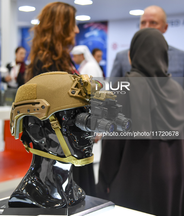 A photo shows a protective helmet with night vision goggles at the 15th edition of the Milipol Qatar 2024 Exhibition and Conference in Doha,...