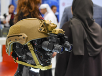 A photo shows a protective helmet with night vision goggles at the 15th edition of the Milipol Qatar 2024 Exhibition and Conference in Doha,...