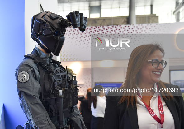 Anti-riot protective suits are displayed at the 15th edition of the Milipol Qatar 2024 Exhibition and Conference in Doha, Qatar, on October...